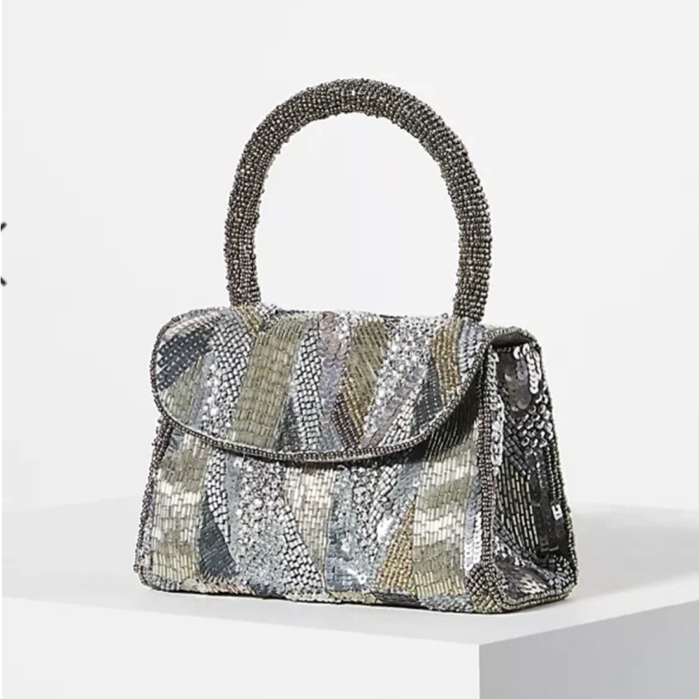 Anthropologie silver sequence purse. NWT “the Samara bag” even has beads.